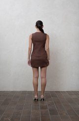 Brown mini skirt with fabric buttons and piping