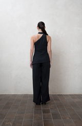 Assymetric black One-shoulder top with white buttons