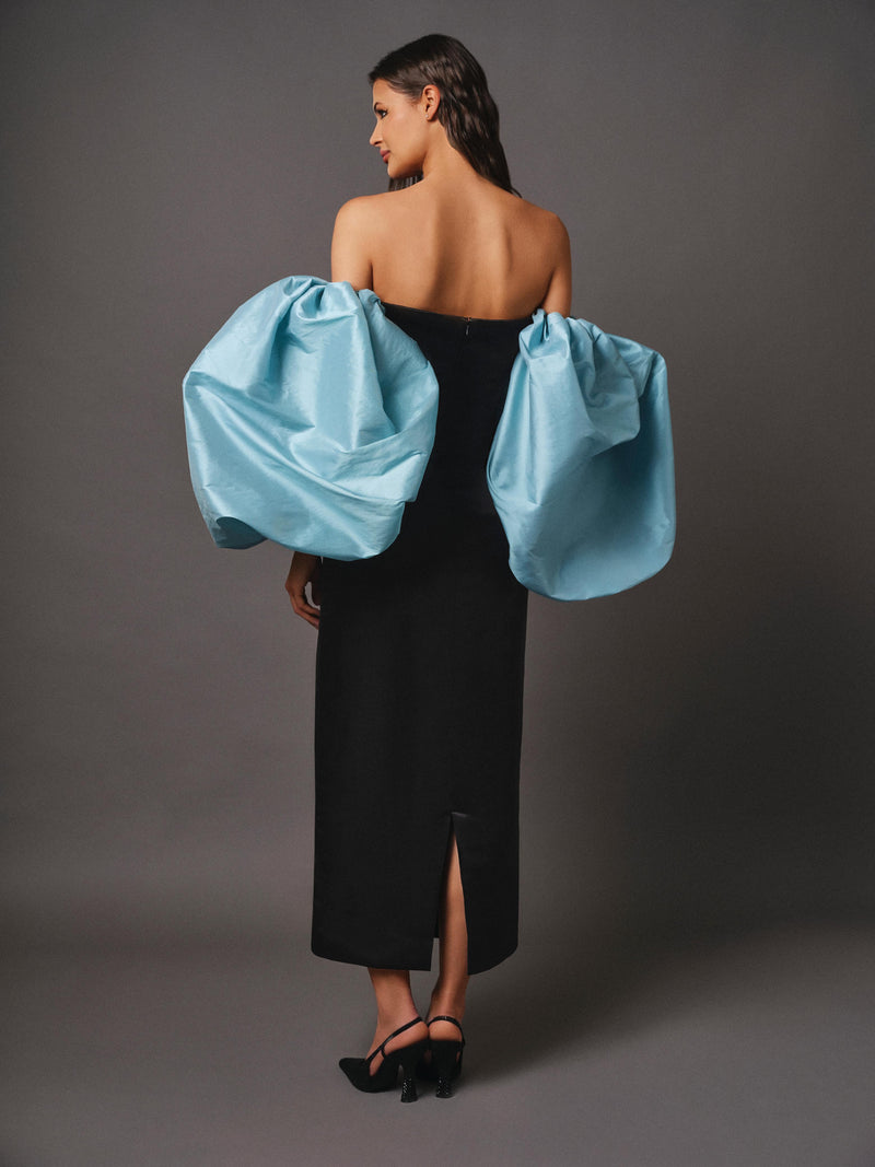 Black satin gown with blue taffeta puff sleeves