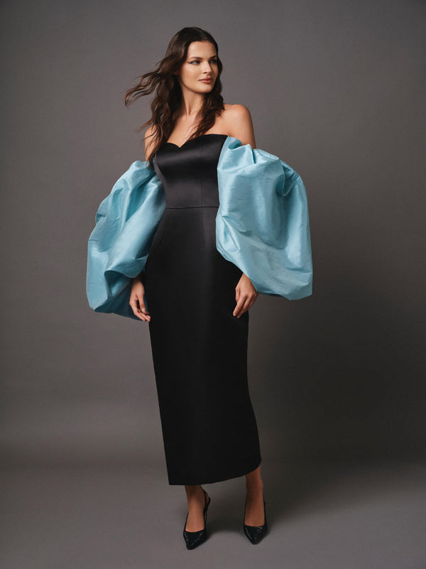 Black satin gown with blue taffeta puff sleeves